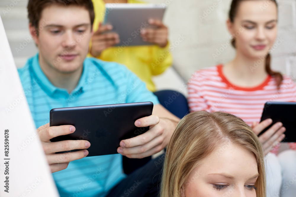 close up of students with tablet pc at school close up of students with tablet pc at school