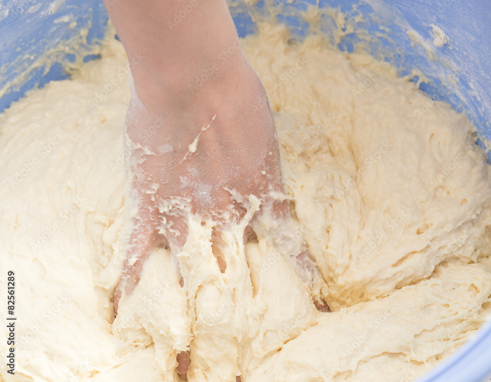 Making dough by female hands Making dough by female hands