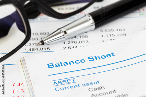 Balance sheet in stockholder report book, balance sheet is mock-
