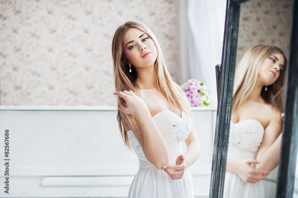 Beautiful woman in a wedding dress Beautiful woman in a wedding dress