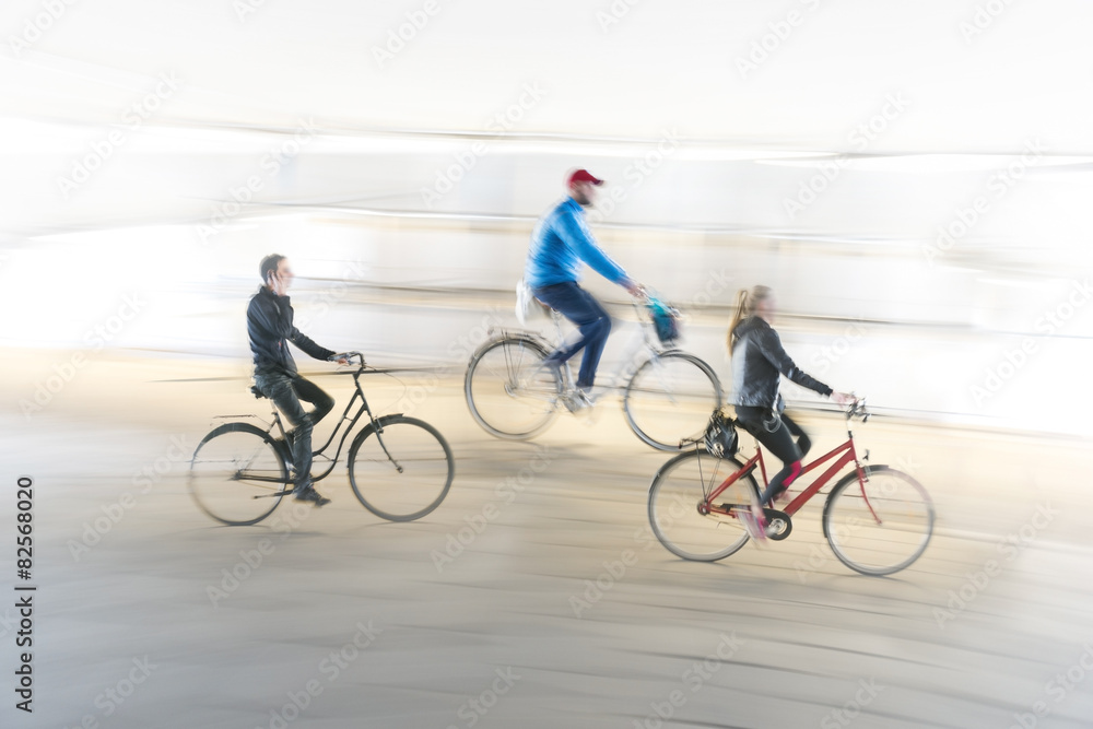 Naklejka premium Three cyclists