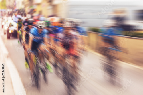 Bikers during bike race on city street, defocussing effect  © Deymos.HR