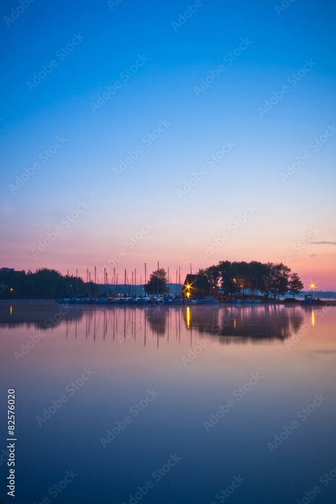 View of a lake during sunrise with colorful sky