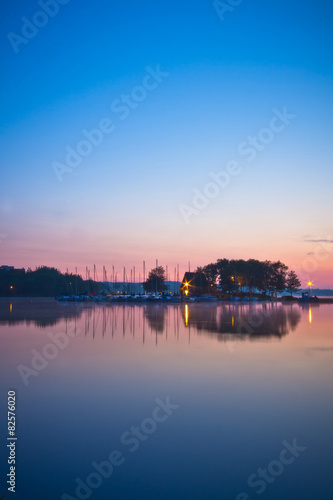 View of a lake during sunrise with colorful sky