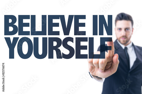 Business man pointing the text: Believe in Yourself