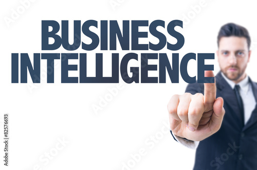Business man pointing the text: Business Intelligence