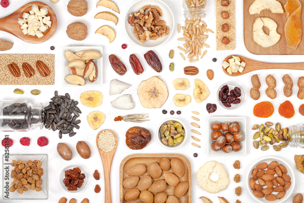 nuts and dried fruits on white background nuts and dried fruits on white background