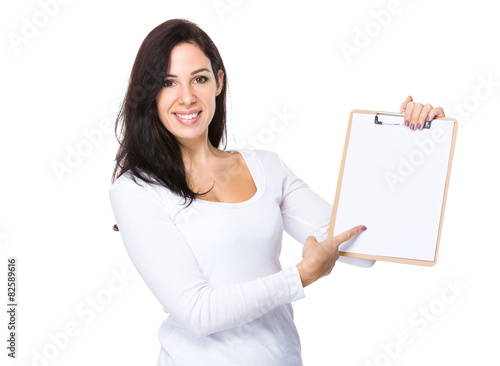Caucasian woman show with clipboard
