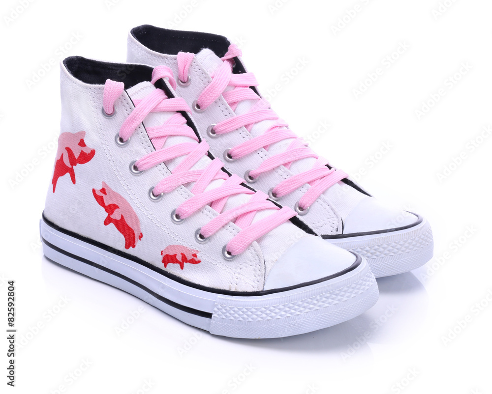 Youth sneakers with printed pigs on a white background - obrazy, fototapety, plakaty 