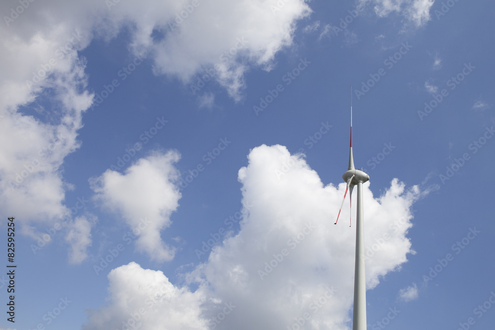 Wind Turbine Against Cloudy Sky Wind Turbine Against Cloudy Sky