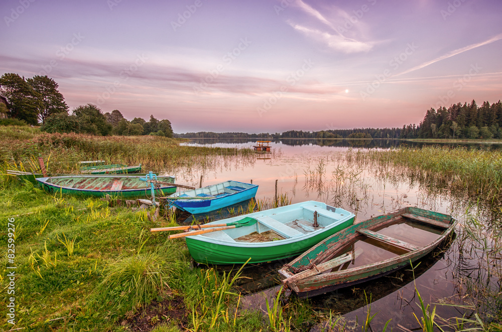 Five old boats on the lake shore Five old boats on the lake shore