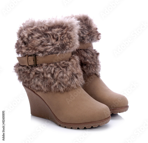  Women's winter boots with fur on a white background
