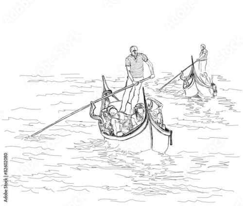 Venice. Italy. The gondolier floats on a gondola with tourists