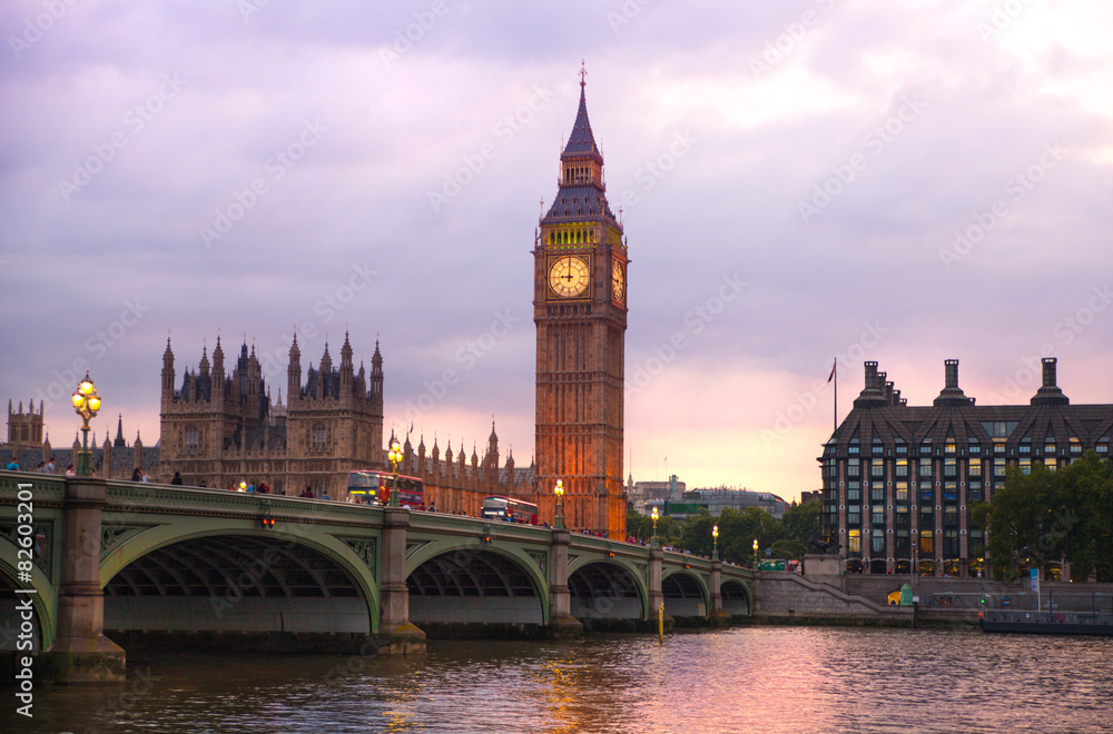 Naklejka premium London sunset. Big Ben and houses of Parliament