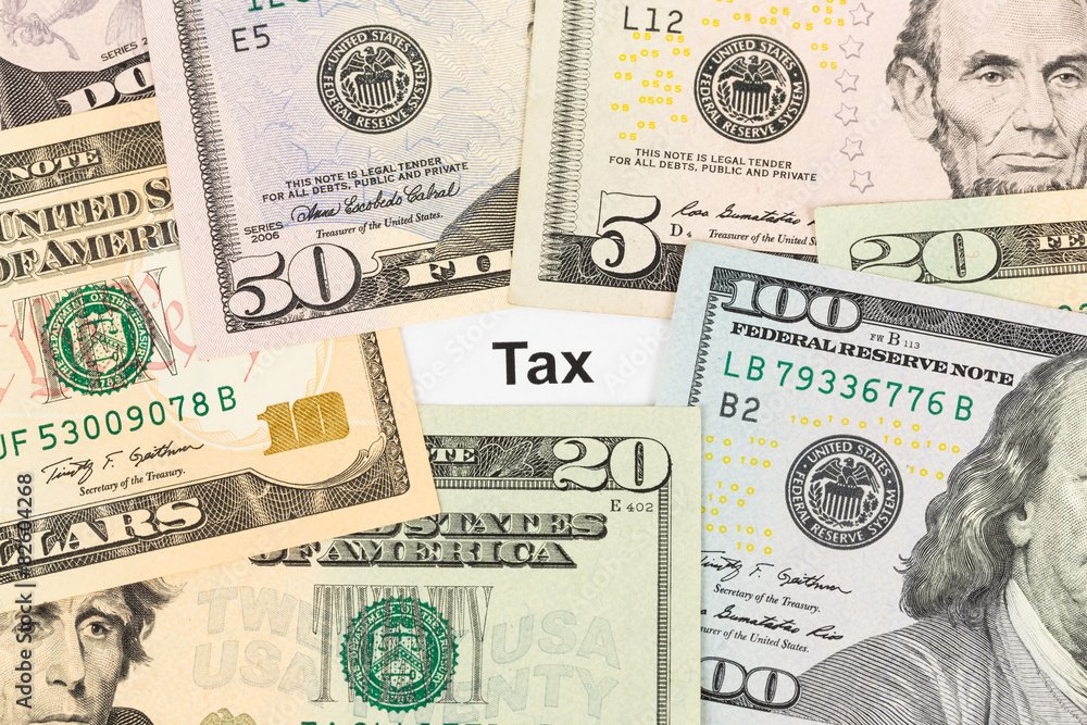 Tax and dollar banknote taxation concept