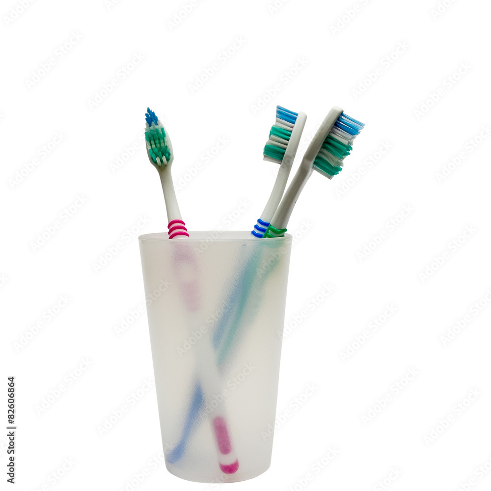 Toothbrushes in a toothbrush tumbler Toothbrushes in a toothbrush tumbler