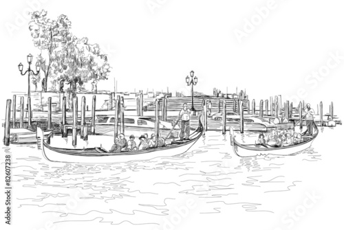 Venice - The gondolier floats on a gondola with tourists