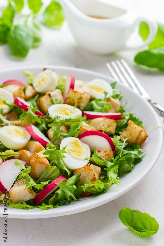 Salad with chicken, croutons, radish and quail eggs Salad with chicken, croutons, radish and quail eggs