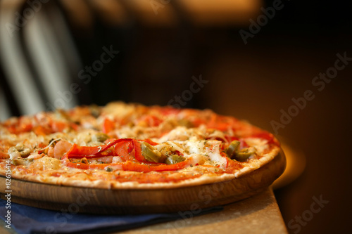 Wallpaper Mural Delicious pizza on table in cafe Torontodigital.ca