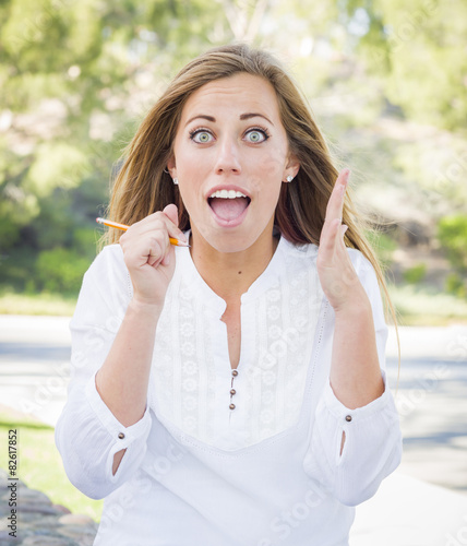 Excited Young Woman With Pe...