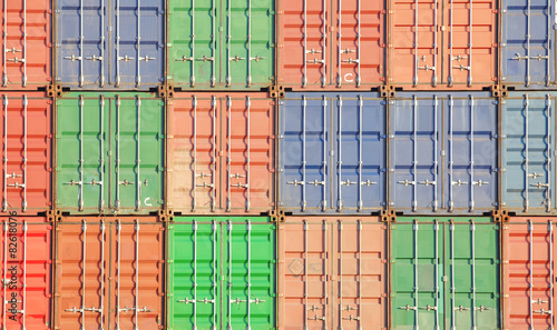 Fotografering Colorful stack of container shipping at dockyard .