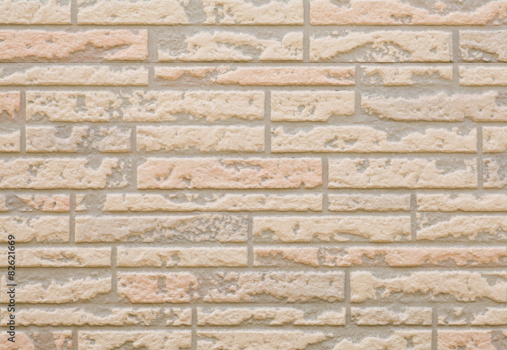 Red brick stone wall seamless background and texture
