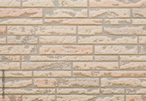 Red brick stone wall seamless background and texture