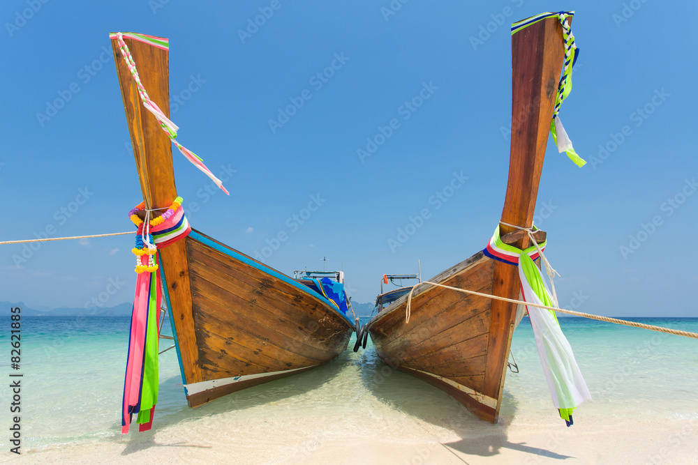 Fototapeta premium Longtail boats at the tropical beach of Poda island in Andaman s