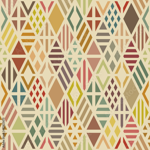 Multicolored geometric seamless pattern with rhombuses.