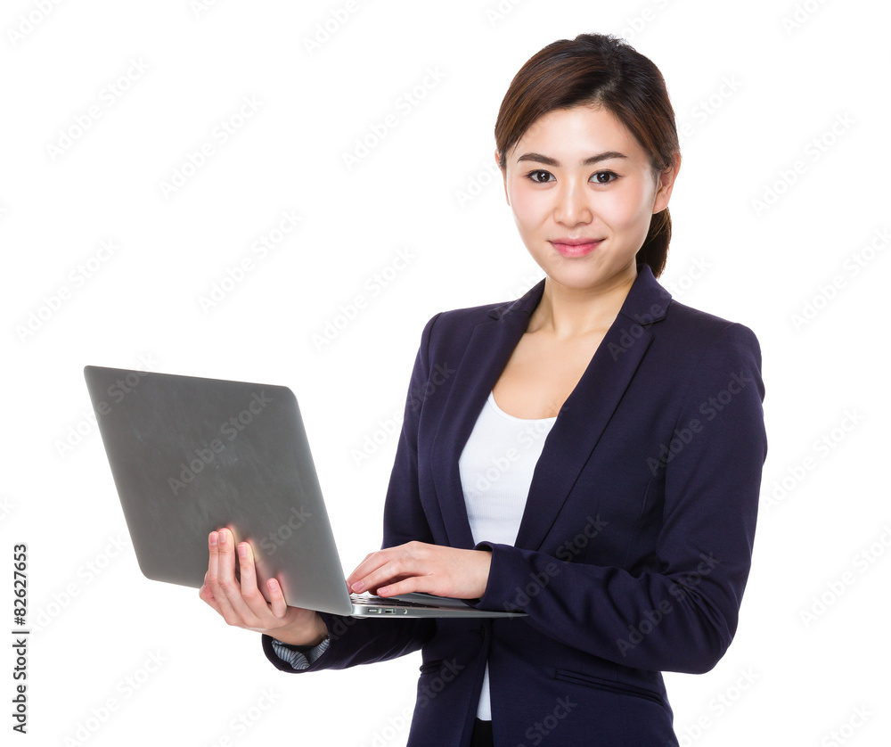 Young businesswoman use of notebook Young businesswoman use of notebook