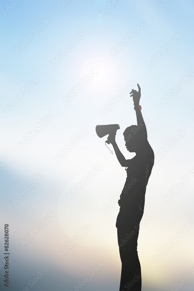 Man with a megaphone, the silhouette. with Lens Flare Man with a megaphone, the silhouette. with Lens Flare