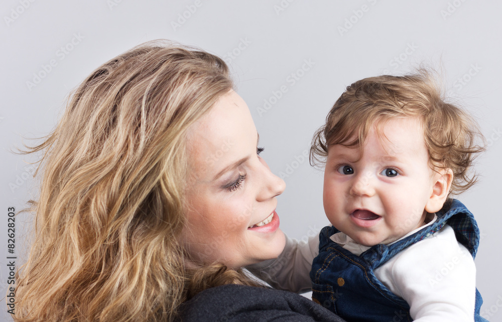 young mother with a little boy . Portrait of mother and son
