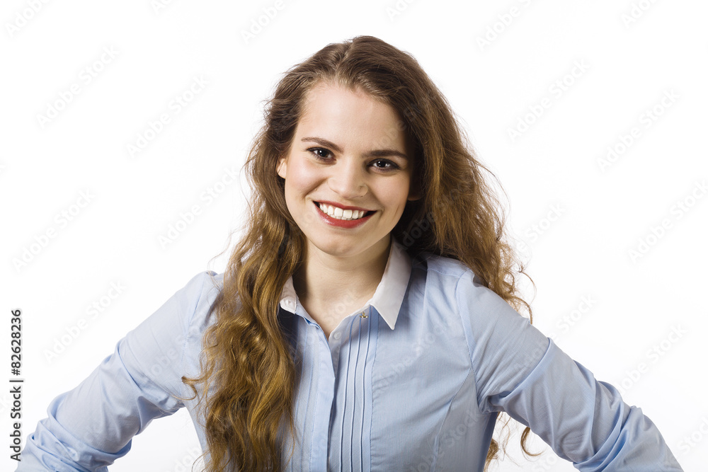 Portrait of a beautiful smiling young woman dressed in a blue sh Portrait of a beautiful smiling young woman dressed in a blue sh
