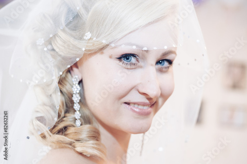 Bride getting ready. beautiful bride in white wedding dress with