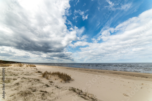 Fototapeta Naklejka Na Ścianę i Meble -  White clouds over beach