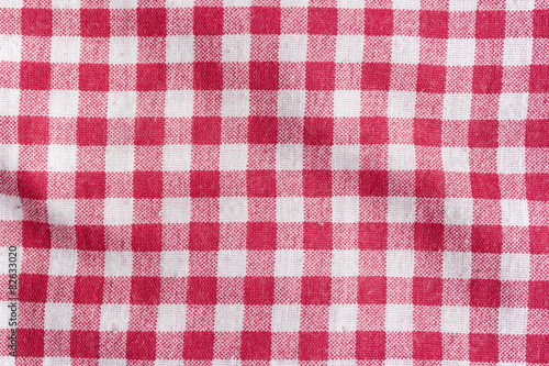 Picnic tablecloth background, red and white fabric texture.