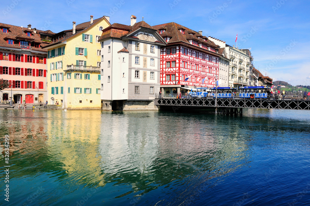  Historic buildings on the Reuss  river bank in Lucerne, Switzerland. 