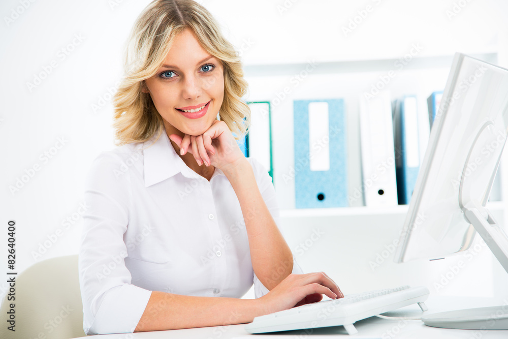 Business woman using computer at office Business woman using computer at office