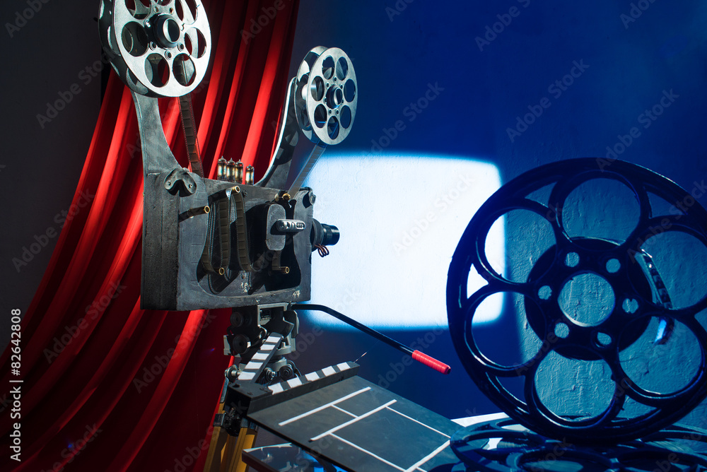 Film projector projecting a movie on the wall Stock Photo