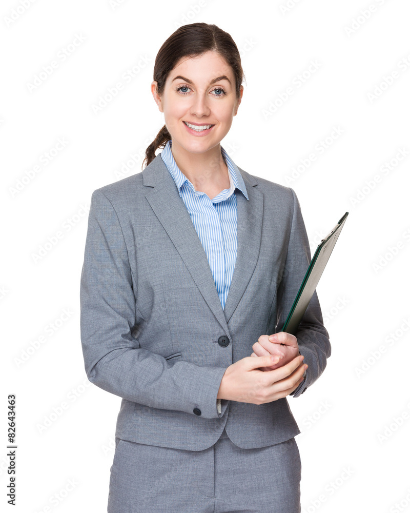 Caucasian businesswoman holding clipboard Caucasian businesswoman holding clipboard