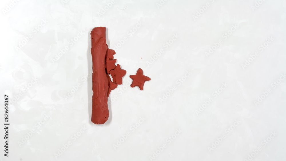 Cartoon of plasticine mug, umbrella, key, car, moon with stars.