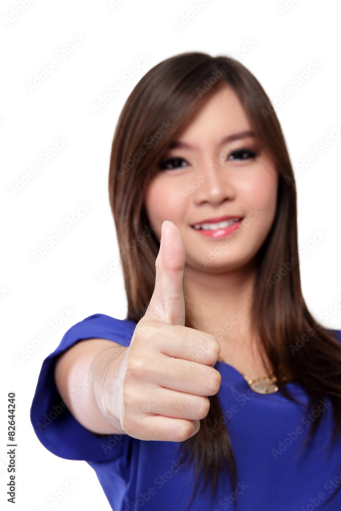 Happy Asian woman with thumbs up gesture, on white Happy Asian woman with thumbs up gesture, on white