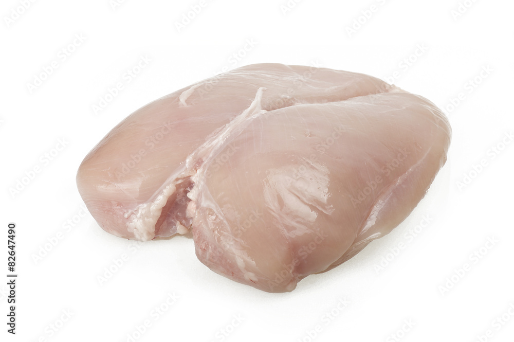 Raw chicken breast fillets on the white Raw chicken breast fillets on the white
