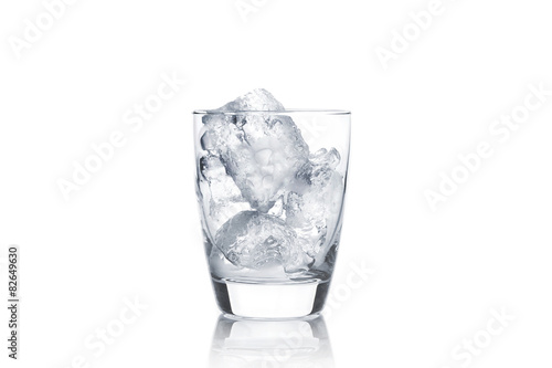  glass with ice cubes on white background