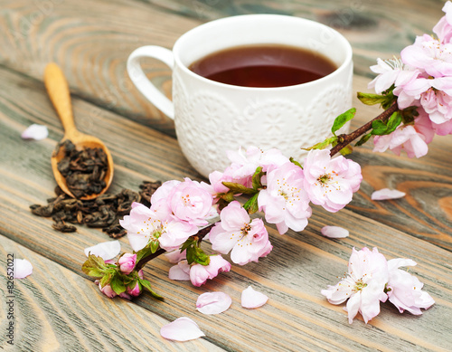 Cup of tea and sakura blossom