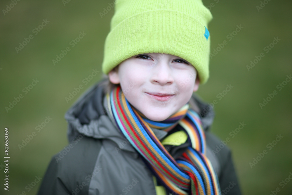 Cheerful warmly dressed boy portrait Cheerful warmly dressed boy portrait