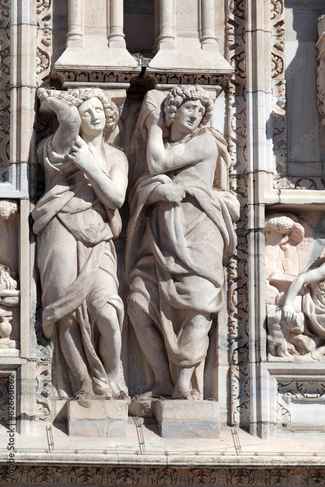 Statues decorating the exterior of the Milan's Duomo