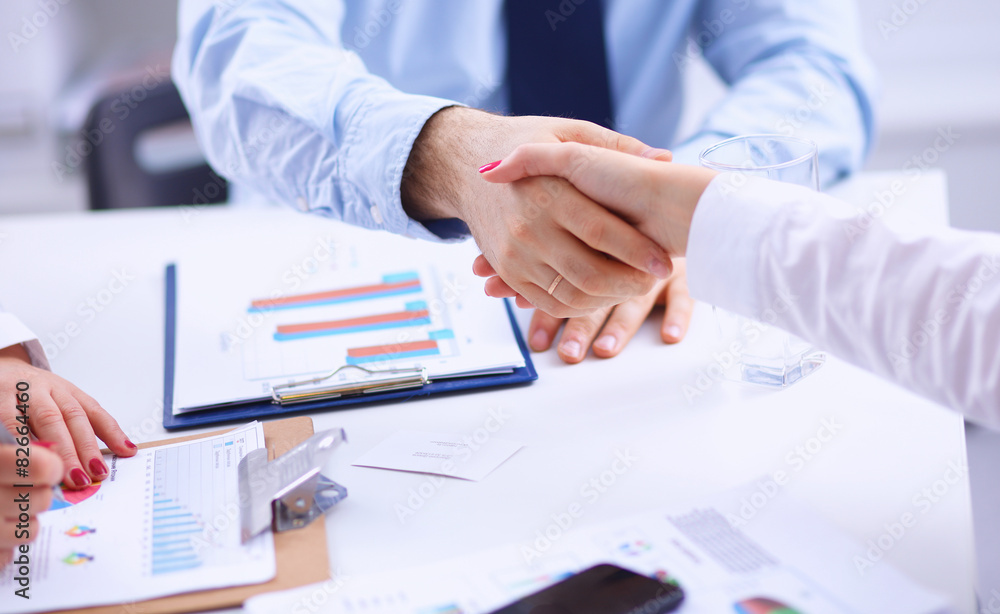 Business team are showing unity with their hands together Business team are showing unity with their hands together