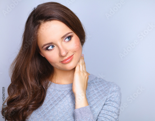 Portrait of an attractive fashionable young brunette woman