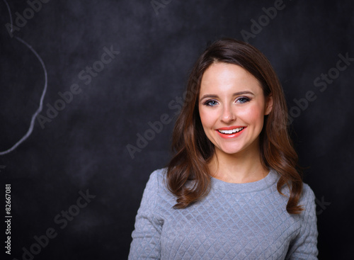 Portrait of an attractive fashionable young brunette woman